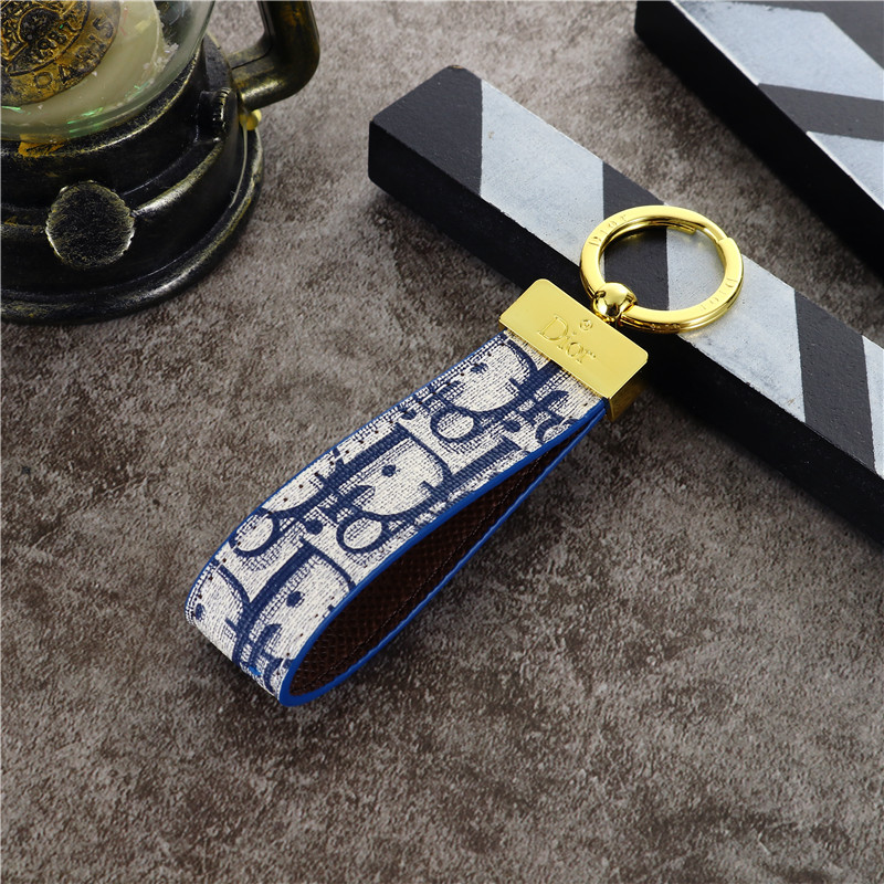 Luxury Dior Keychain: Polished metal, iconic logo – elevate your style with AnyCases.