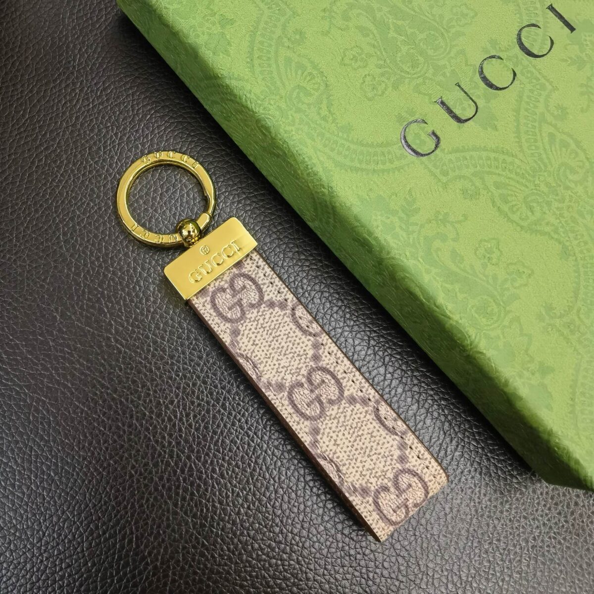 Elegant Gucci key chains with intricate designs, showcasing opulence and sophistication