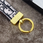 Dior Elegance: A compact statement piece by AnyCases for keys or bags