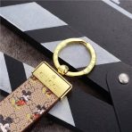 Whimsical Mickey Mouse and Gucci keychains