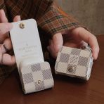 Close-up of Louis Vuitton AirPods Case in luxurious design