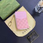 Side view of the Gucci Signature Leather Wallet showcasing its sleek design