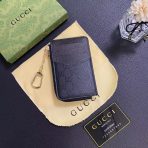 Gucci Signature Leather Wallet & Card Holder on a stylish surface