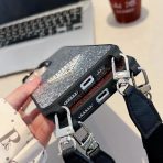 Designer Prada iPhone accessory with detachable crossbody strap